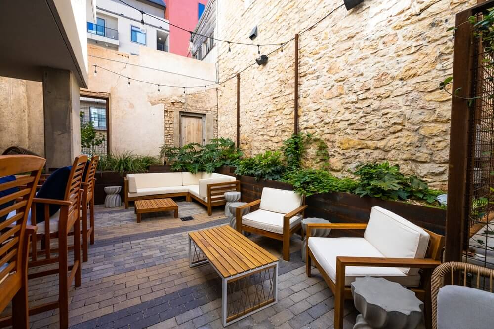 Outdoor area of the Cauldron with patio chairs