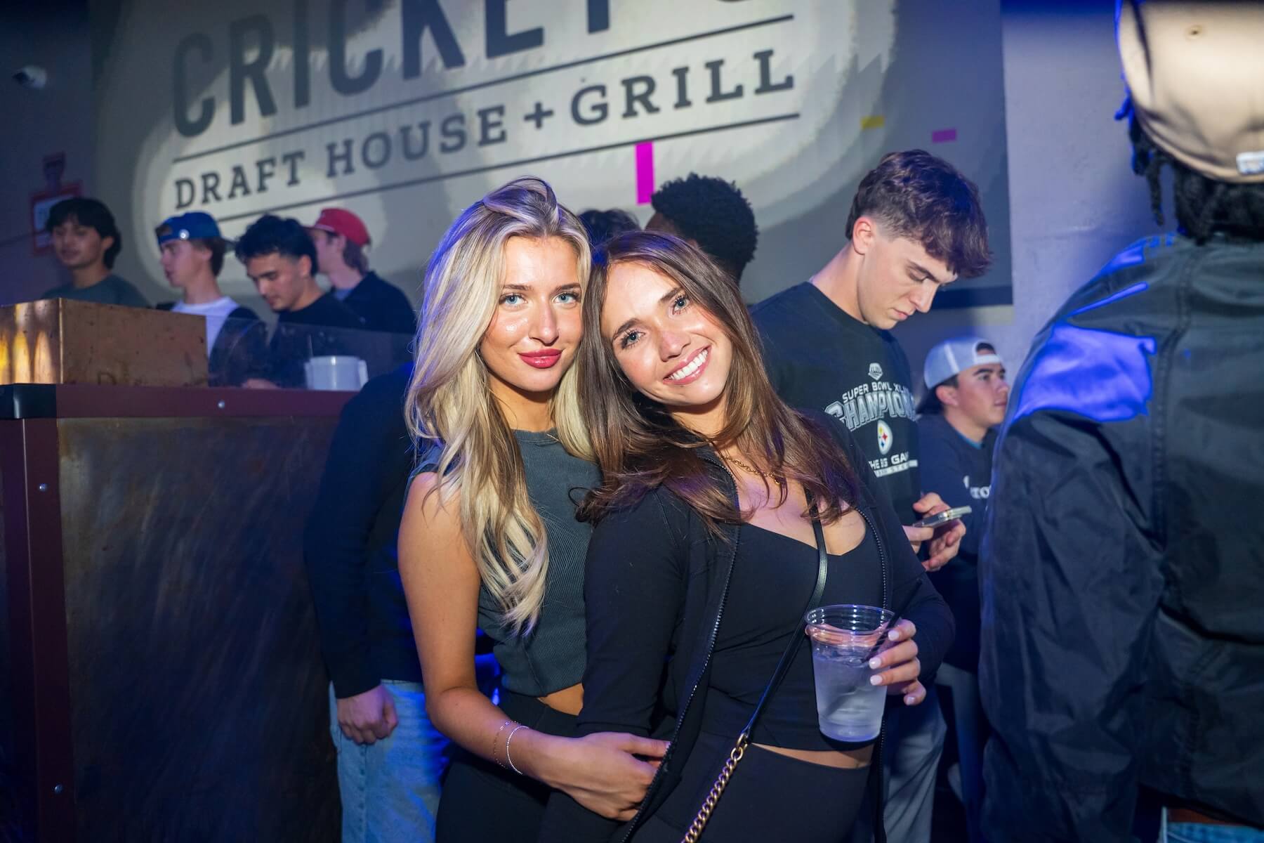Two girls posing at Cricket's