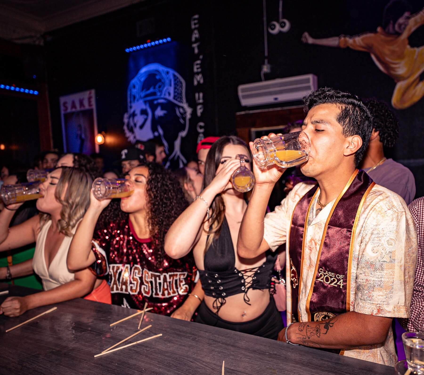 Group of friends drinking at the bar