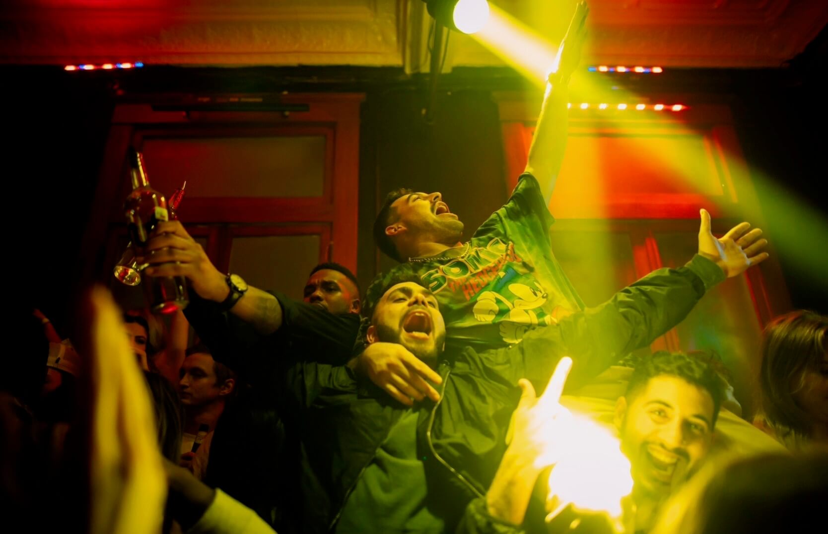 Guys celebrating at the Vault